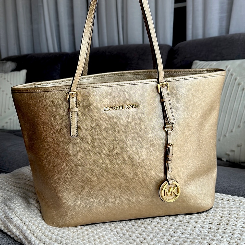 Michael Kors tote in metallic champagne color.